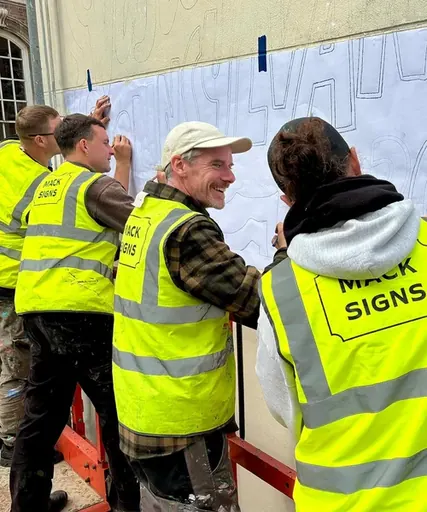 Mack Signs team at work