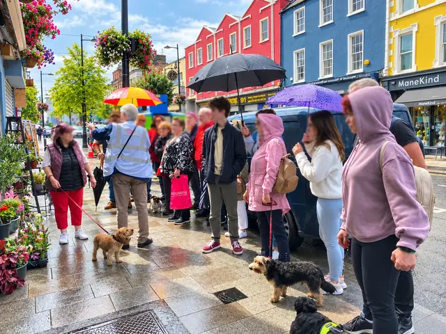 Visitors enjoying a guided walk among Dundalk’s colourful shopfronts